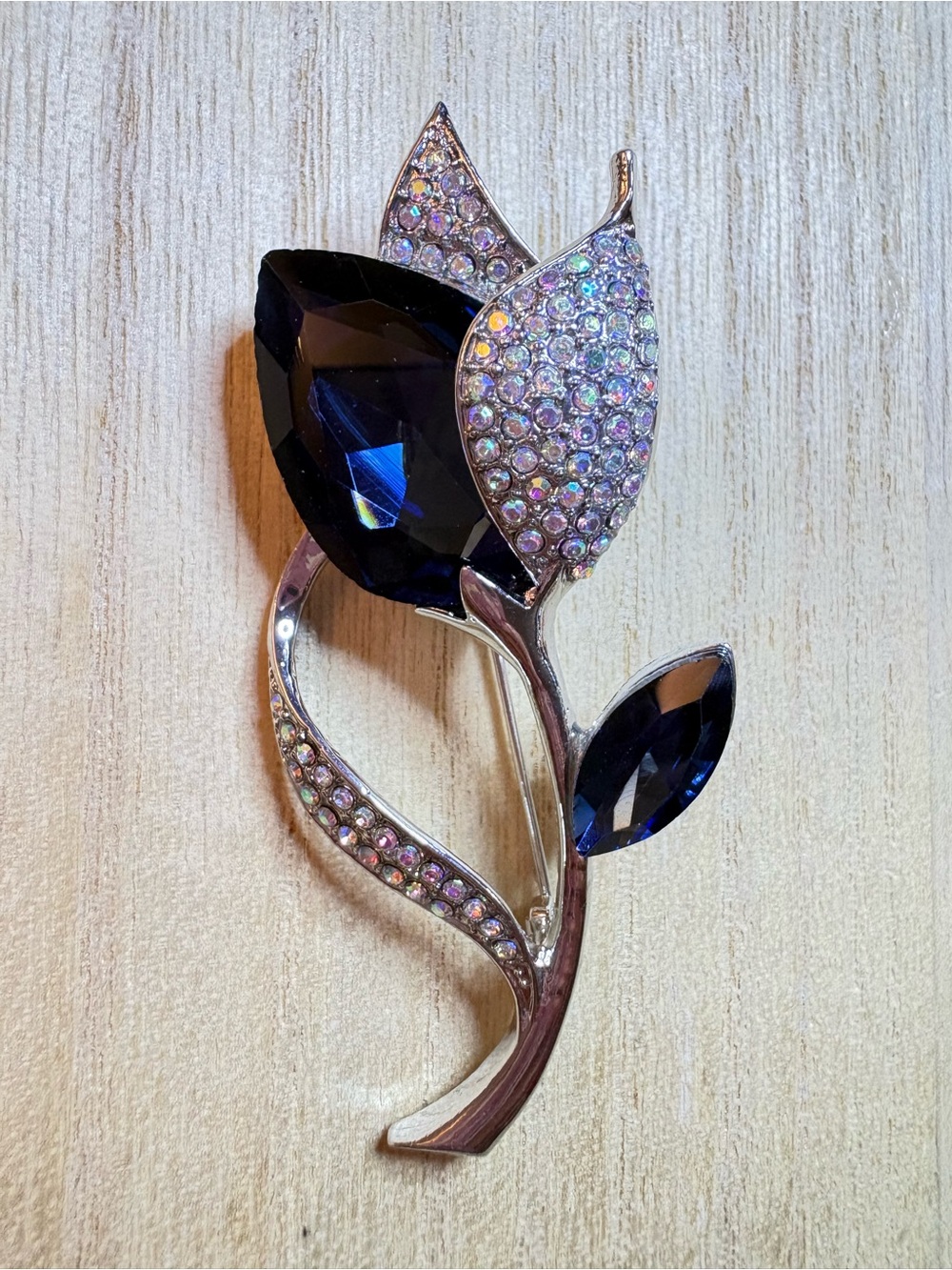 Blue Crystal Floral Brooch with Rhinestone Accents